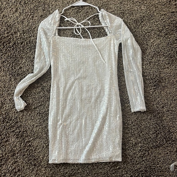 white dress for engagement Rib T-Shirt color:low-rise-roomy-jeans-aged-mid-blue swatch:https://www.motelrocks.com/cdn/shop/files/ANCO-V-NECK-TOP-PEPPERCORN-LOW-RISE-ROOMY-JEANS-AGED-MID-BLUE-5657.jpg?v=1783584710&width=48 Size:US  18W Seashell broderie anglaise cotton